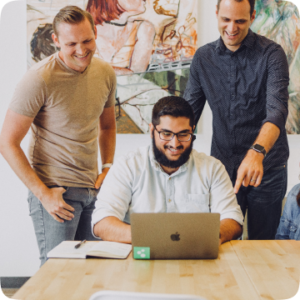 Team reviewing betting service results together at a desk